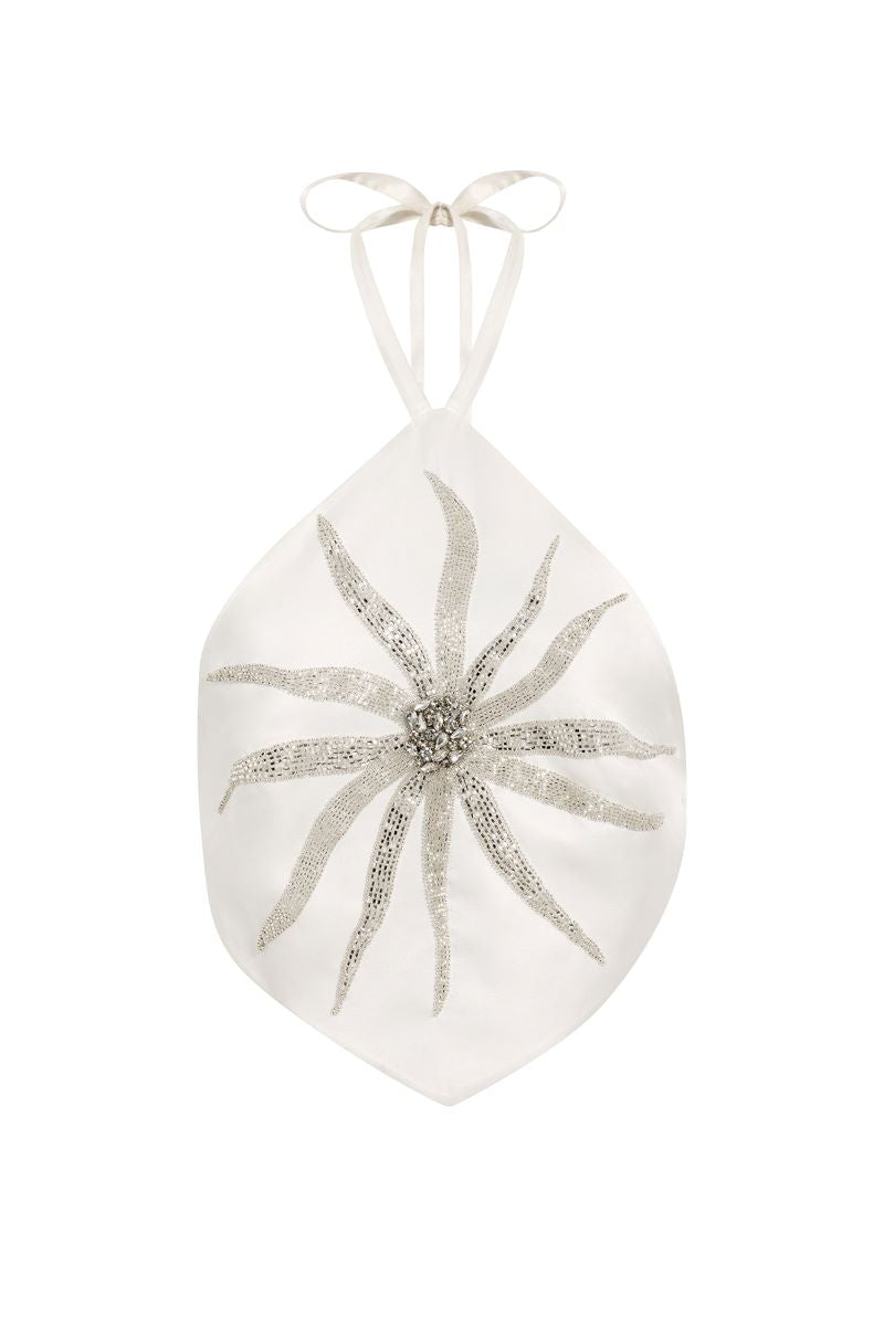 White The Innocent Top by IKINITA, featuring a stylish, lightweight design with a relaxed fit, perfect for casual wear.
