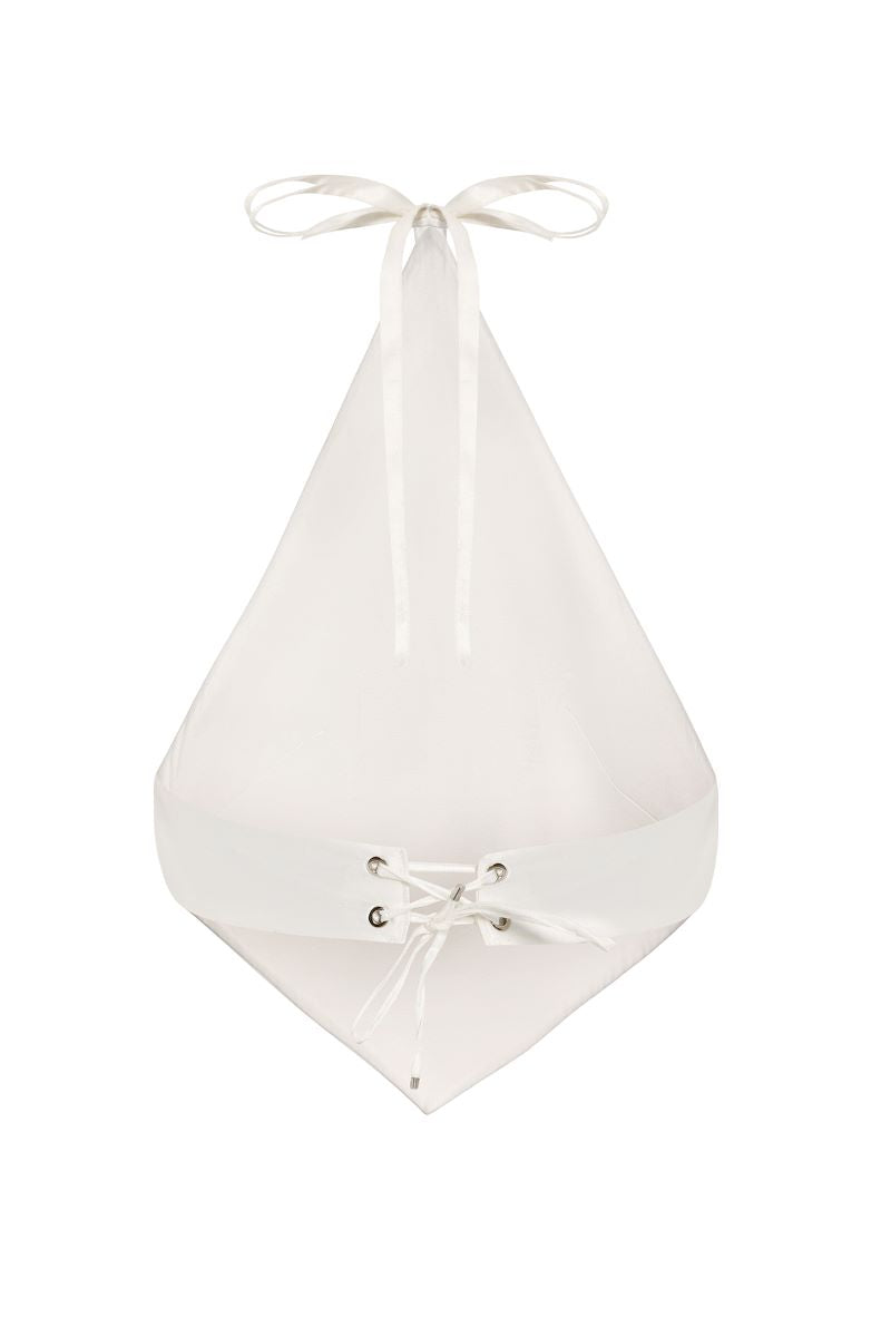 White IKINITA Innocent Top, stylish sleeveless blouse with a relaxed fit, shown in a natural pose.