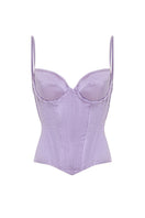 Purple candy-inspired corset top by IKINITA, featuring a fitted design with lace-up front and decorative details.