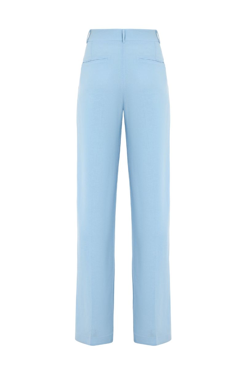 Blue THE SUN pants by IKINITA, shown in a relaxed fit with a comfortable waistband, displayed on a neutral background.