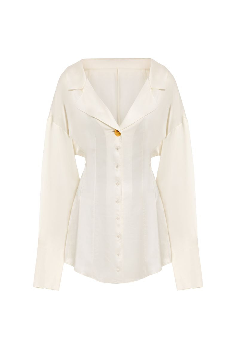 Cream IKINITA shirt dress styled as a mini dress, featuring a relaxed fit and casual elegance.