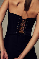 Black Wave Corset top by IKINITA featuring a stylish, fitted design with wave pattern details, perfect for trendy fashion looks.