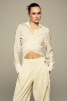 IKINITA ULYSSE yellow pants displayed, showcasing slim fit design in butter yellow fabric.