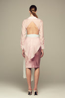 Pink Ulysse shirt by IKINITA, featuring a soft fabric and stylish design, displayed flat with buttons and collar.