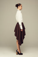 Brown modular mini skirt by IKINITA, featuring a stylish, versatile design perfect for casual or chic outfits.