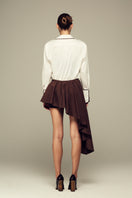 Brown IKINITA modular mini skirt with a fitted waist and sleek design, perfect for stylish casual or evening wear.