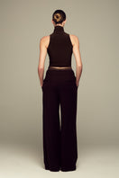 IKINITA brown moon pants featuring a relaxed fit and stylish design, displayed on a mannequin.
