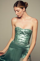Emerald green NAUSICA midi skirt by IKINITA featuring a flowy, stylish design perfect for casual or formal wear.