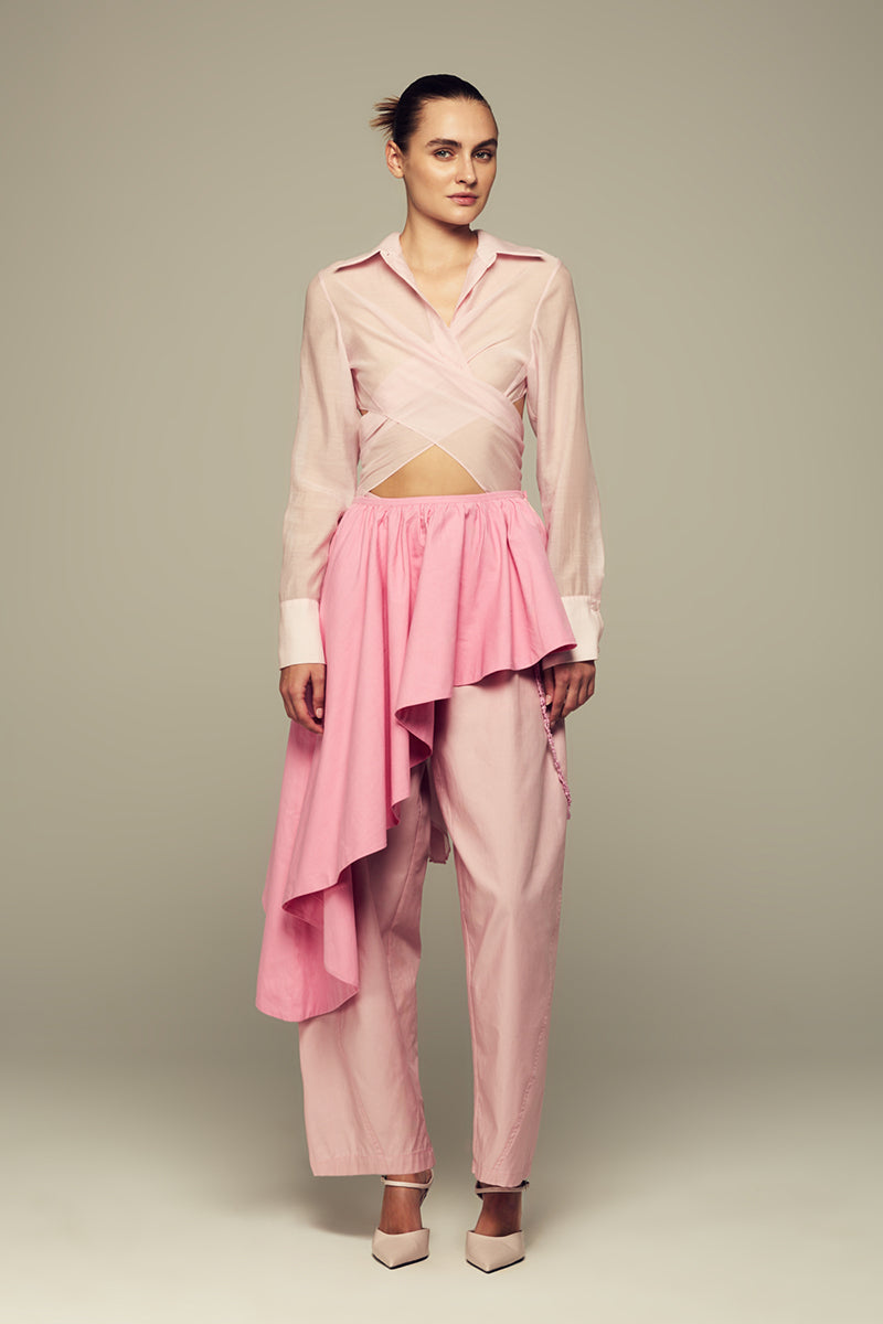 Pink Ulysse shirt by IKINITA made of soft fabric, featuring a classic collar and button-front design.