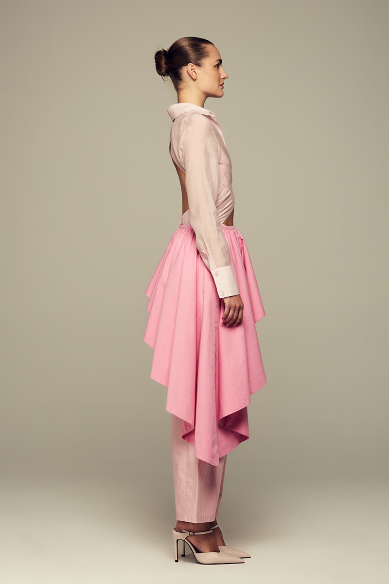Pink IKINITA ULYSSE shirt with long sleeves and collar, displayed flat on a white background.