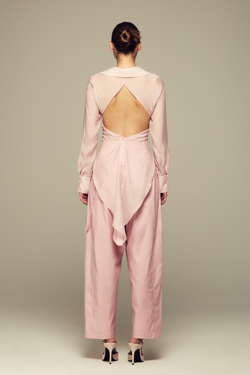 Pink Ulysse shirt by IKINITA, featuring a soft fabric and casual fit, displayed on a neutral background.