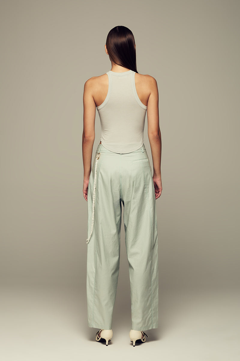 Blue IKINITA Wave Top, stylish sleeveless blouse with flowing fabric and wave design, perfect for casual and summer wear.
