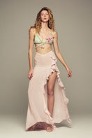 Pink Lotus Eater maxi skirt by IKINITA with a flowy, elegant design and soft fabric, shown on a model.