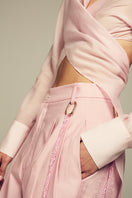 Pink Ulysse shirt by IKINITA, featuring a stylish fit with soft fabric and classic collar, displayed on a hanger.