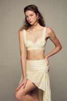 IKINITA butter yellow co-ord set featuring a stylish top and matching pants, perfect for a chic, coordinated look.