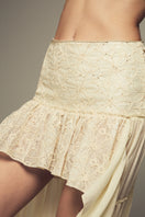 IKINITA butter yellow co-ords set featuring a stylish top and matching pants, perfect for casual or chic daytime wear.