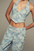 IKINITA blue IRIS pants featuring a relaxed fit and adjustable waistband, made from lightweight fabric.