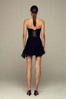 Black Wave Corset top by IKINITA featuring a fitted design with wavy detailing on the fabric.