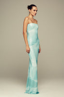 Blue water gown by IKINITA featuring flowing fabric and elegant design, perfect for formal occasions.