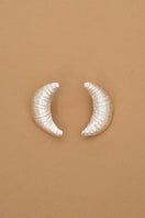 Silver croissant earrings by Oz Objects featuring detailed, crescent-shaped designs, perfect for stylish everyday wear.