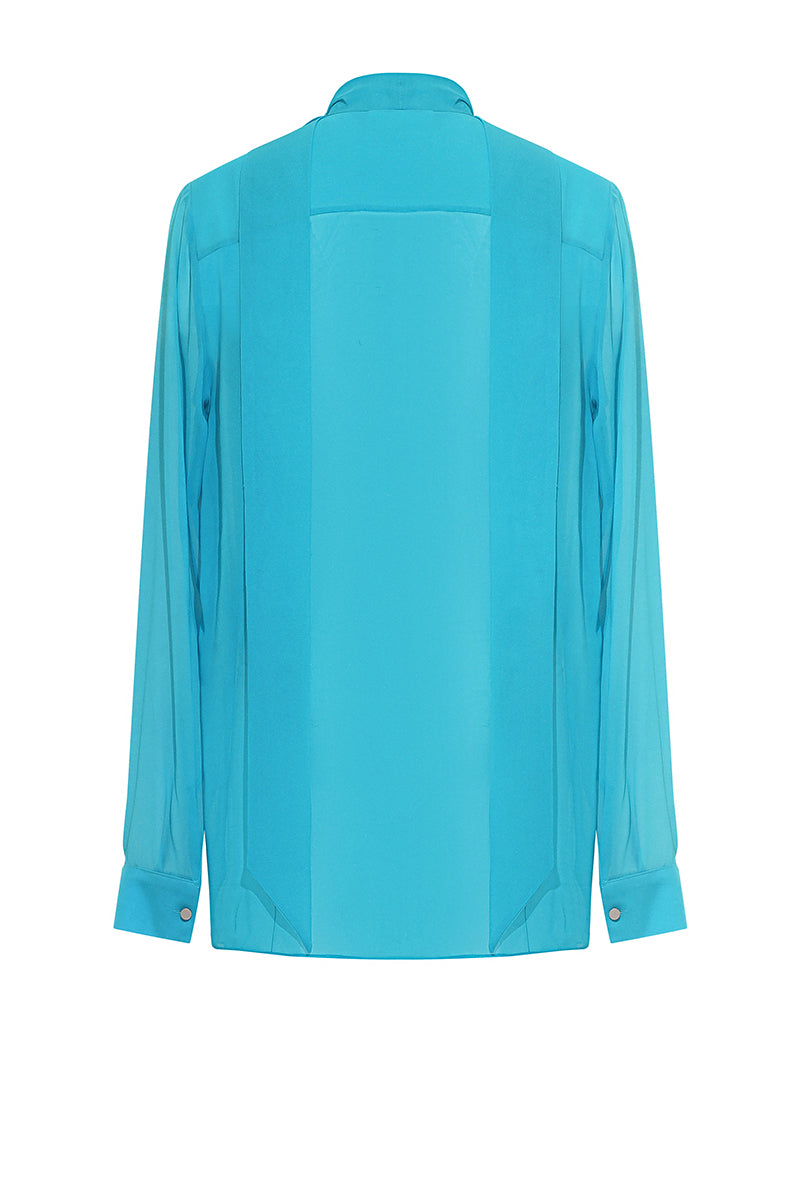 Light blue Lekieu Dawlish shirt displayed on a hanger, showcasing the casual button-up style and soft fabric.