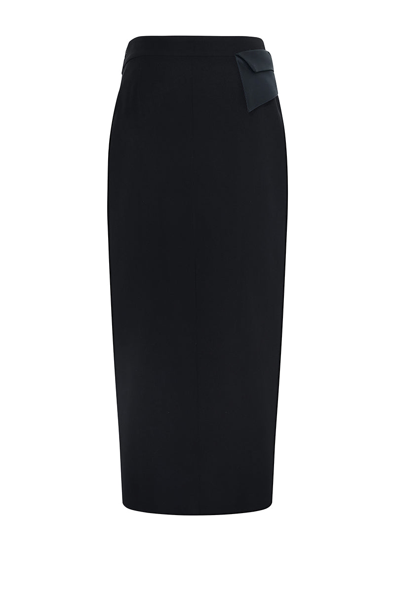 Black LEKIEU PAMPLONA midi skirt displayed on a hanger, showcasing its sleek design and flowy fabric.
