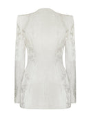 Cream LEKIEU Badajoz jacket displayed on a hanger with a tailored fit and subtle stitching details.