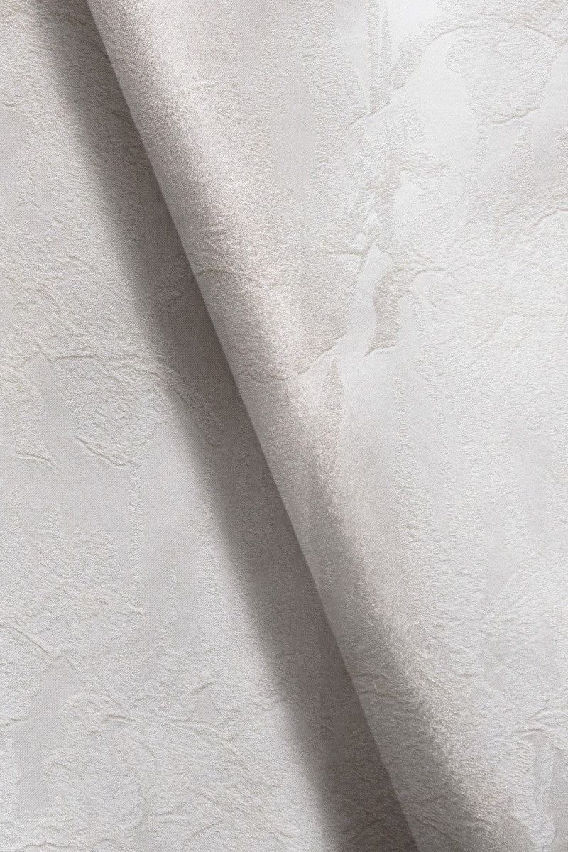 Cream Badajoz jacket by Lekieu, featuring a stylish, tailored design with a smooth fabric finish.