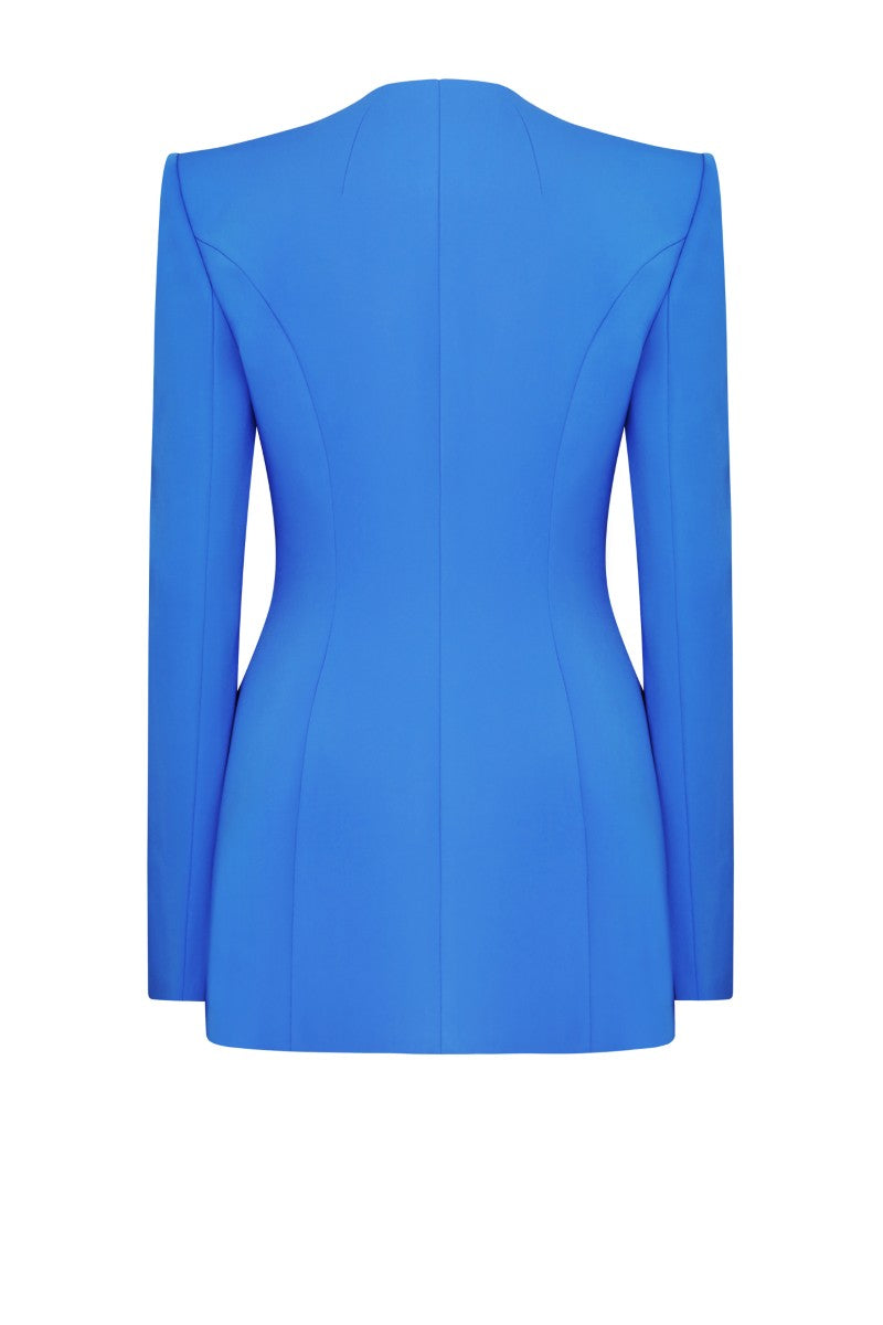 Blue Marseille jacket by Lekieu, stylish outerwear with a modern fit, shown hanging on a wooden hanger.