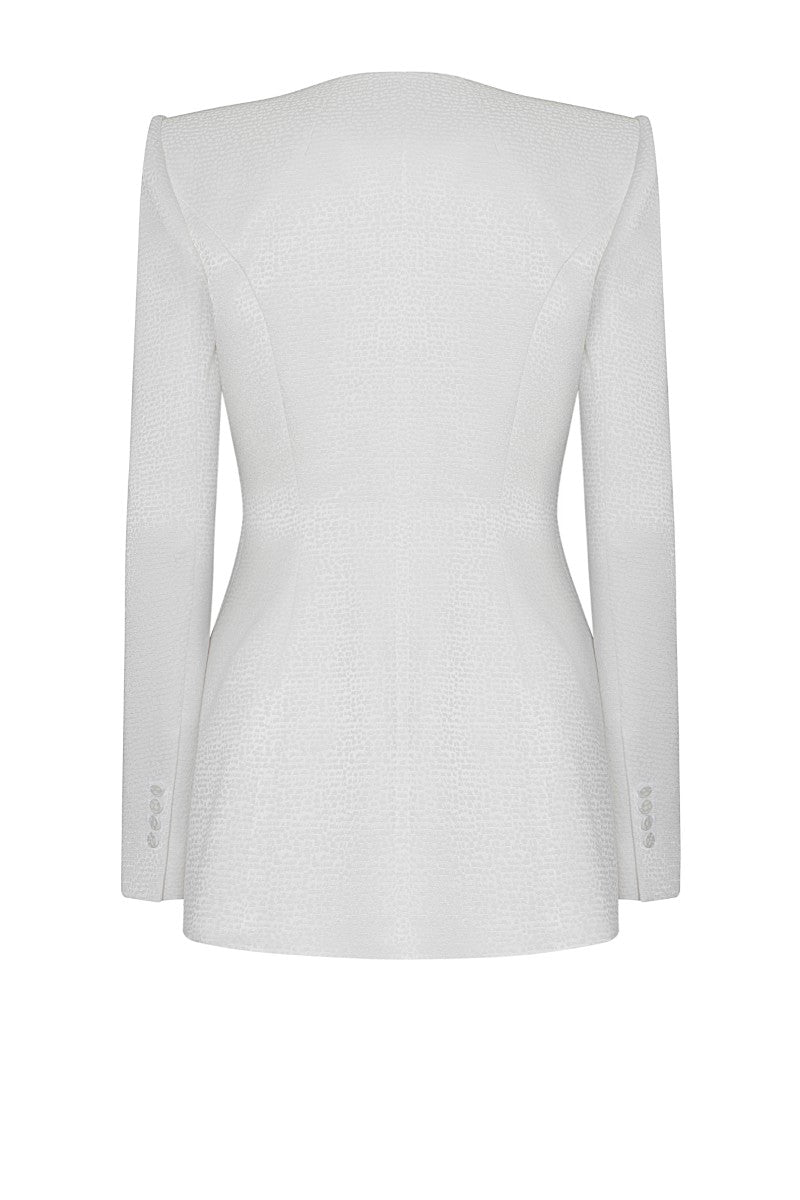 White Montpellier jacket by Lekieu, stylish outerwear with a tailored fit, shown hanging on a wooden hanger.