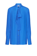 LEKIEU Toulouse blue shirt with button-down design, featuring a classic collar and long sleeves, displayed on a hanger.