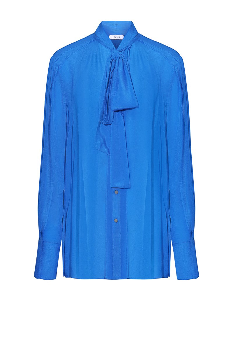 LEKIEU Toulouse blue shirt with button-down design, featuring a classic collar and long sleeves, displayed on a hanger.
