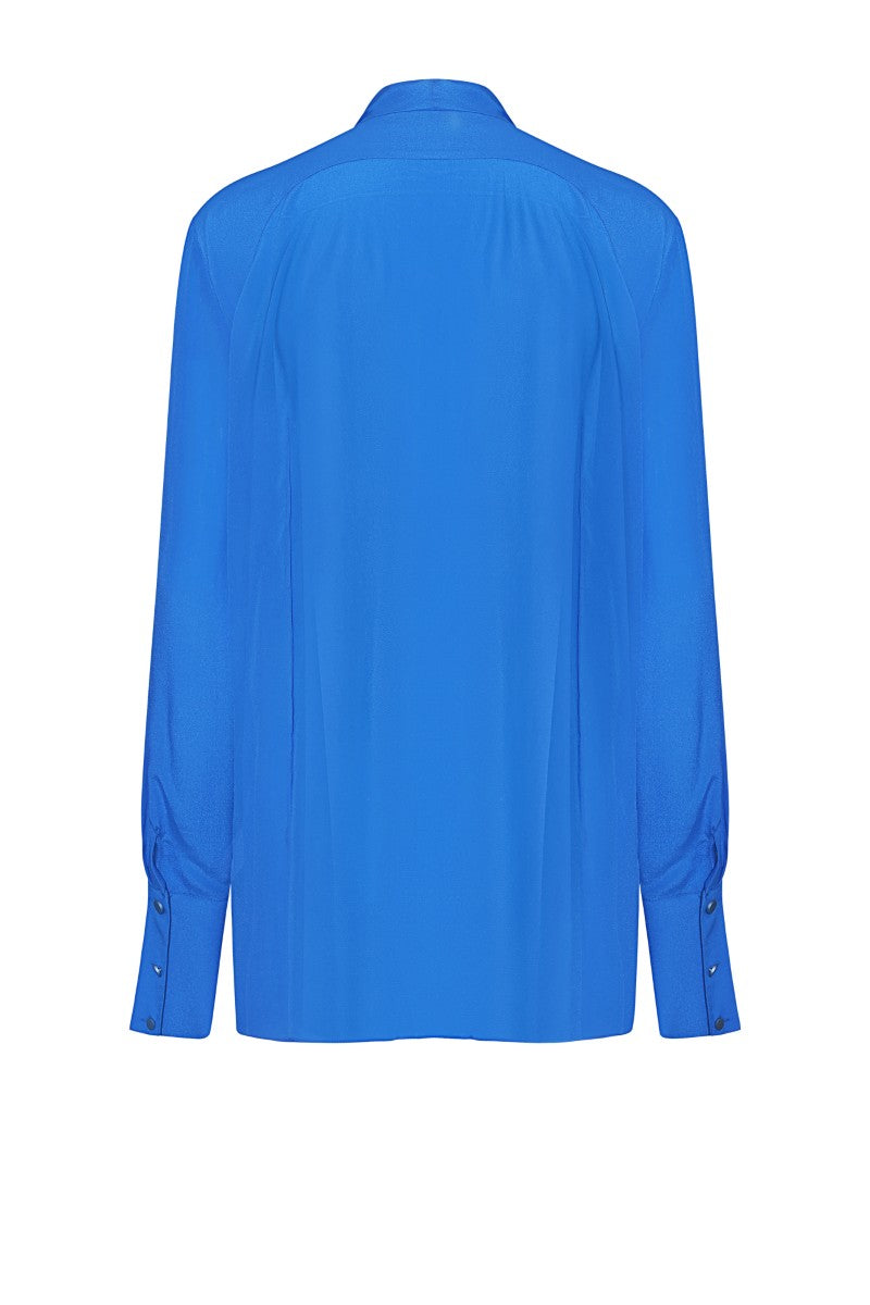 Blue Toulouse shirt by Lekieu, displayed flat with button details and collar, showcasing its stylish design.
