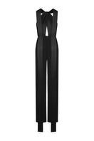 Black LEKIEU ELYSÉES jumpsuit with long sleeves and fitted silhouette, shown on a model in a stylish indoor setting.
