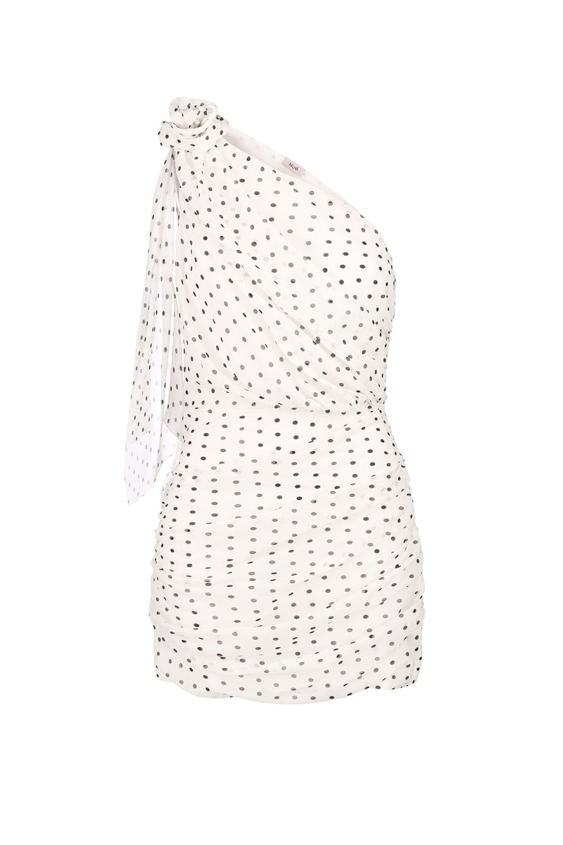 Nué Virginie white mini dress displayed on a hanger, showcasing its elegant design and lightweight fabric.