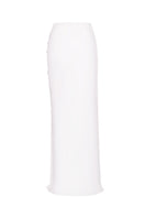 Nué Blanche white maxi skirt with flowing fabric and waistband, styled for casual or dressy wear.