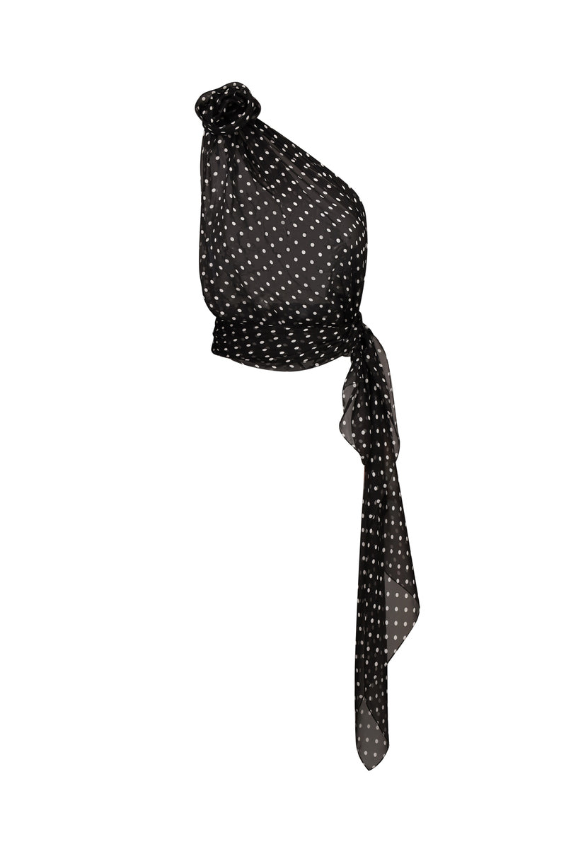 Nué HELOÏSE black top, stylish sleeveless blouse with a fitted design, shown on a model with a minimalist background.
