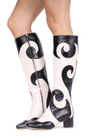 Terry de Havilland Val Waves Boots showing stylish black leather ankle boots with wave detailing and pointed toes.