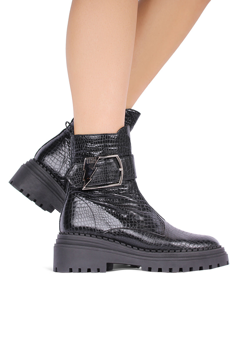 Black Festival boots by Terry de Havilland featuring ankle-high design and stylish stitching.