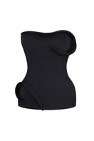 Nué Christelle black corset top, stylish and fitted, shown on a model with lace-up front and structured design.