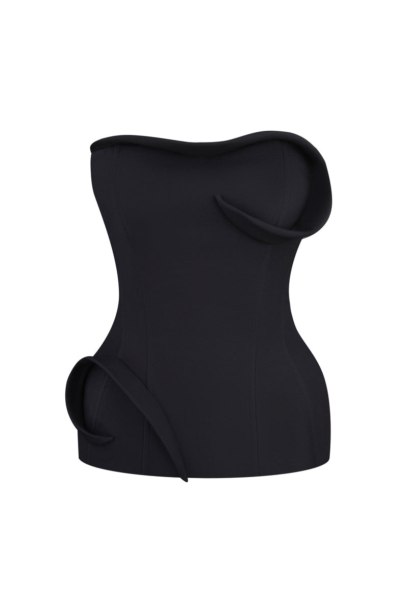 Nué Christelle black corset top, stylish and fitted, shown on a model with lace-up front and structured design.
