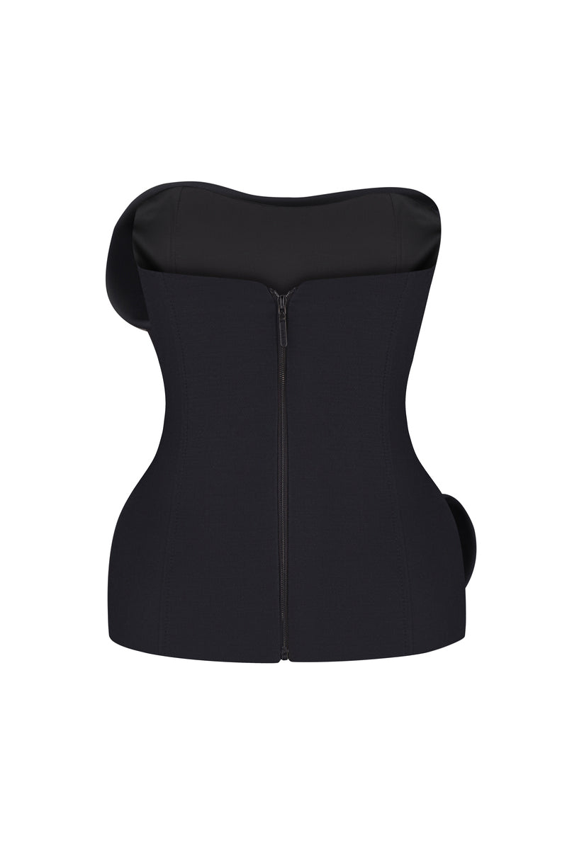 Nué Christelle black corset top, close-up showing fitted design, lace-up front, and structured bust for stylish women's tops.