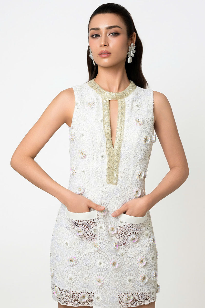 Valenciani mini lace dress with floral appliqué, featuring delicate lace fabric and intricate floral detailing.