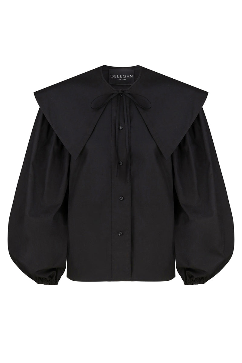 Black collar shirt by DELEGAN, featuring a classic design with a button-up front and short sleeves, displayed on a mannequin.