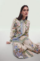 BY HAÓ Orlina linen co-ord set with a relaxed fit, featuring a matching top and pants in lightweight, natural linen fabric.