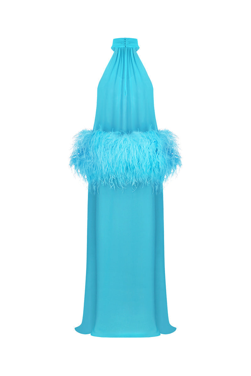 Nué Anaïs blue gown with flowing fabric and elegant design, displayed on a mannequin.