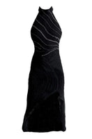 Black Lyra gown by Francisco Arce, elegant formal dress with flowing fabric and sophisticated design, perfect for special occasions.