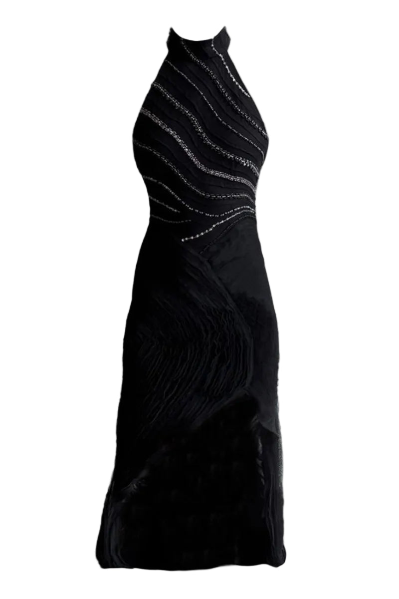 Black Lyra gown by Francisco Arce, elegant formal dress with flowing fabric and sophisticated design, perfect for special occasions.