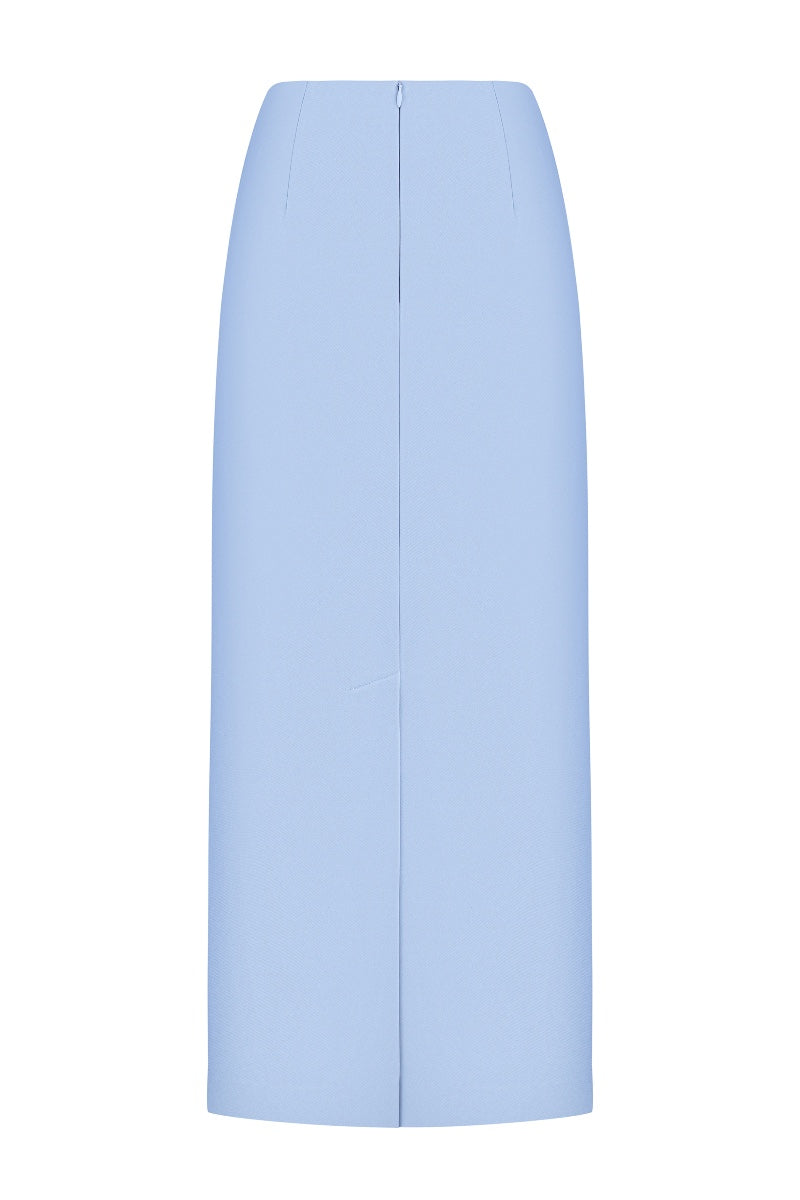 Nué Delphine midi skirt in soft fabric, featuring a flowing design and elegant length perfect for versatile styling.