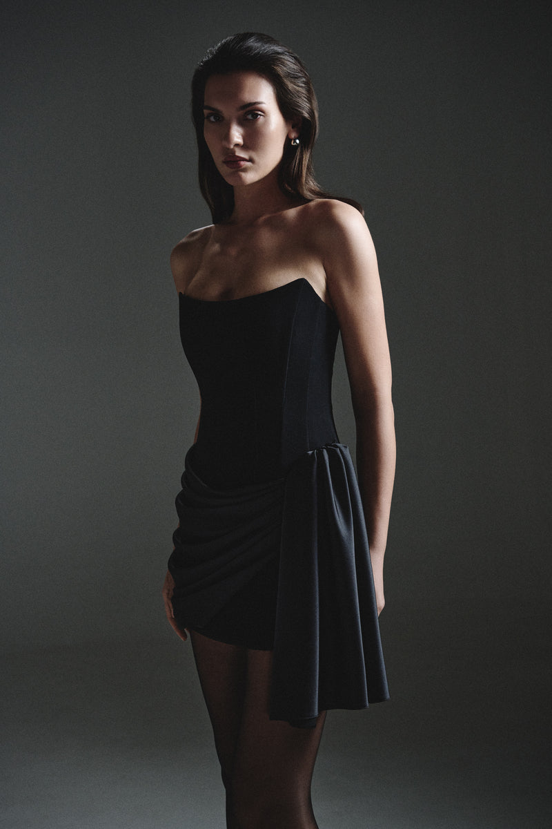 Black HOPE dress and trail mini dress by BALYKINA, featuring stylish design and comfortable fit, shown on a model.